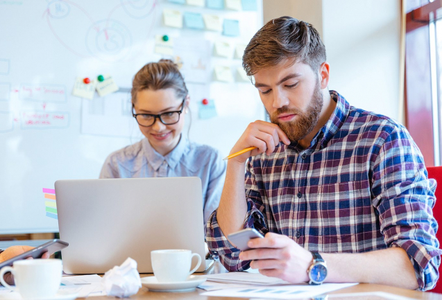 demo-attachment-127-people-working-in-office-P3DBYE3